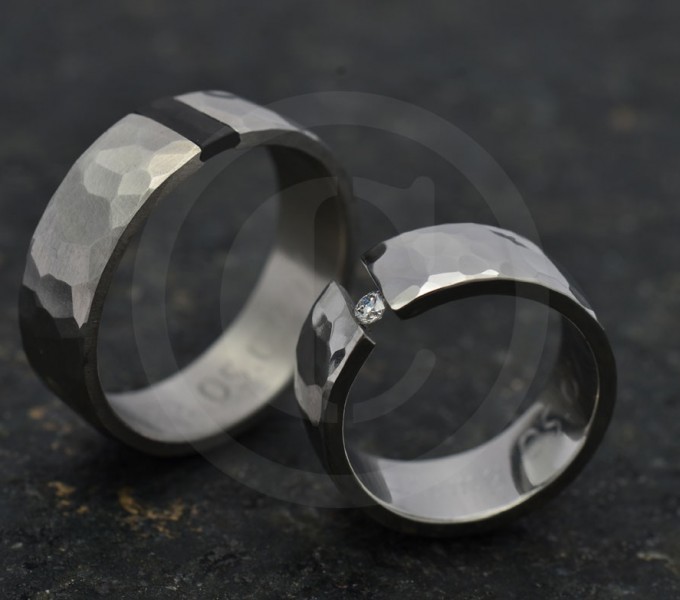 Palladium wedding bands with round cut diamond set and precious ebony wood. 